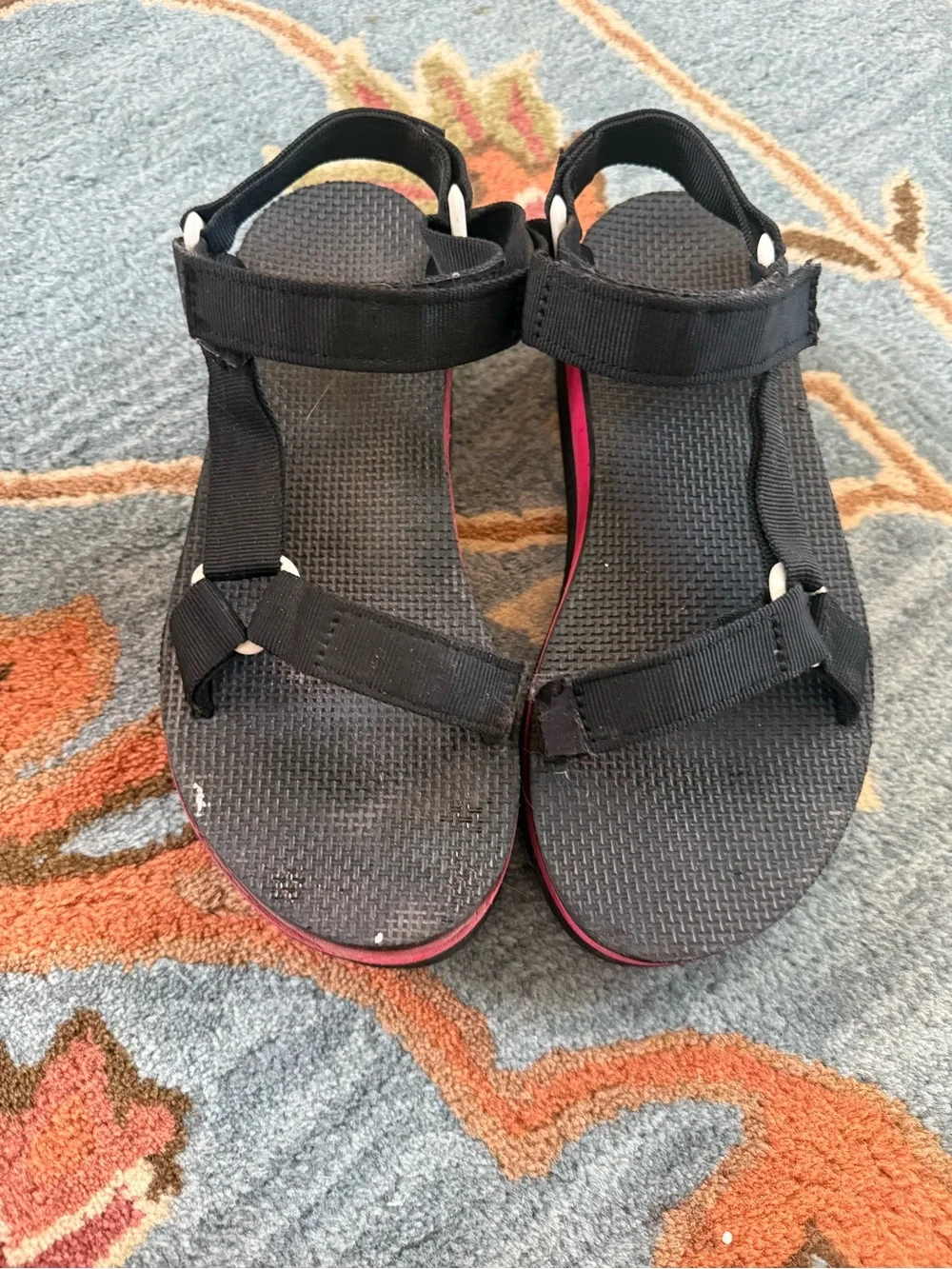 Teva’s Black Strappy Platform Sandals with Red Accent